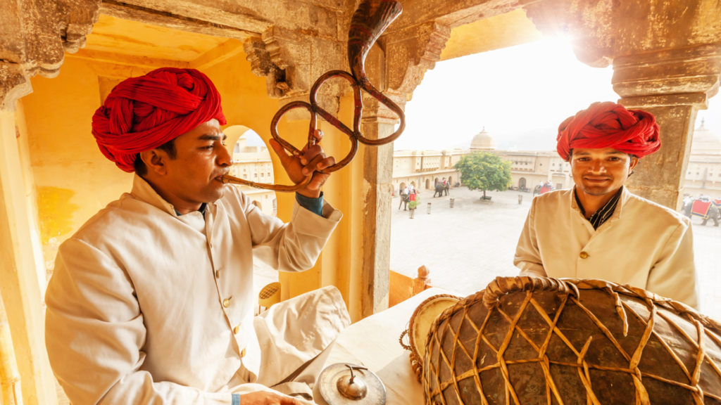 Planning a Heritage Trail Through Jaipur: Where to Stay and What to Eat 2 Traditional Rajasthani musicians performing during a heritage trail in Jaipur