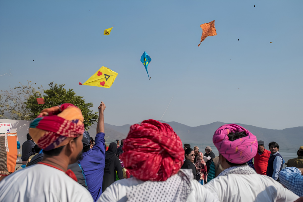 Discovering the Joy of Rooftop Kite Flying on a Jaipur Terrace 1 Rooftop kite flying in Jaipur during Makar Sankranti with guests wearing traditional Rajasthani turbans