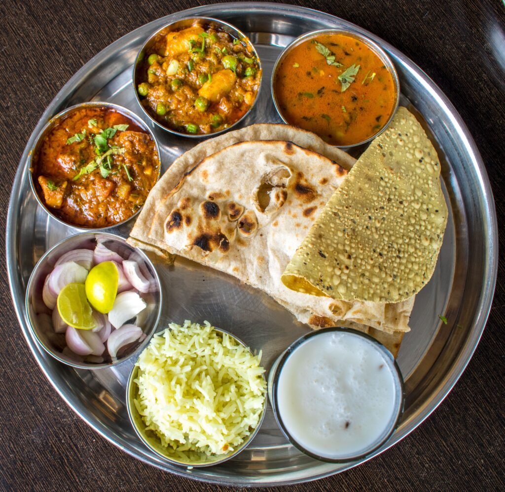 Gourmet Rajasthani Cooking at a Heritage Hotel 4 Traditional Indian thali with curries, flatbreads and accompaniments