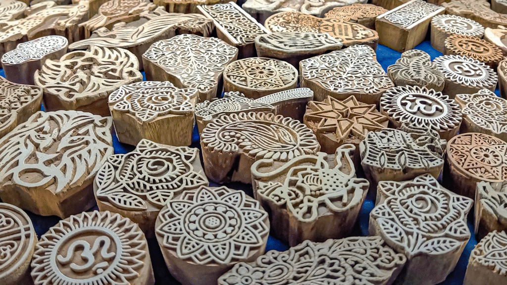 Discover Rajasthani Block Printing at Jaipur's Finest Textile Shops 2 Hand-carved wooden blocks used for Rajasthani block printing in Jaipur
