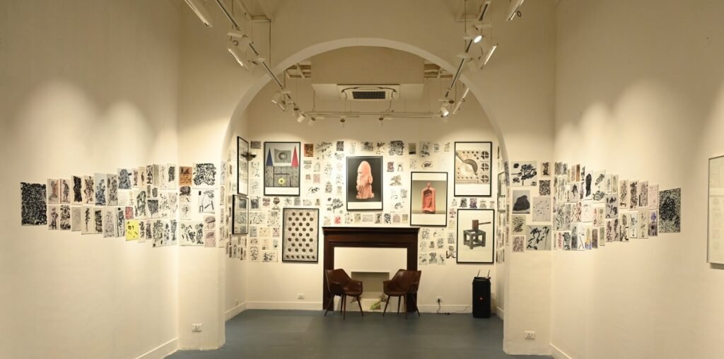 Winter Festivals in Jaipur: 7 Events and Their 2027 Dates 2 Art exhibition inside a Jaipur gallery showcasing contemporary sketches and installations during the winter cultural season | DeraMandawa