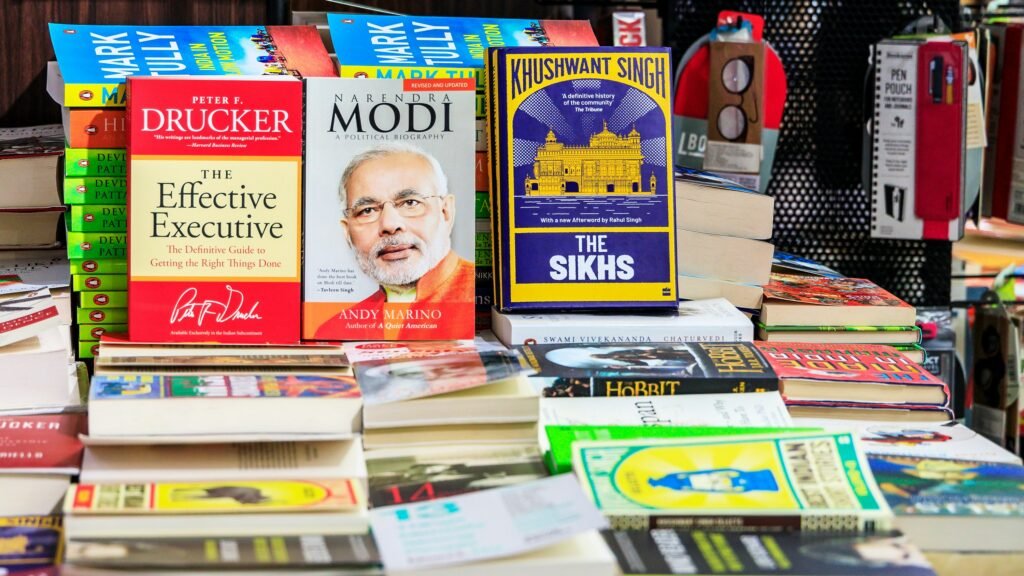 Winter Festivals in Jaipur: 7 Events and Their 2027 Dates 1 Books displayed on outdoor tables at a literary event, which is one of the festivals in Jaipur