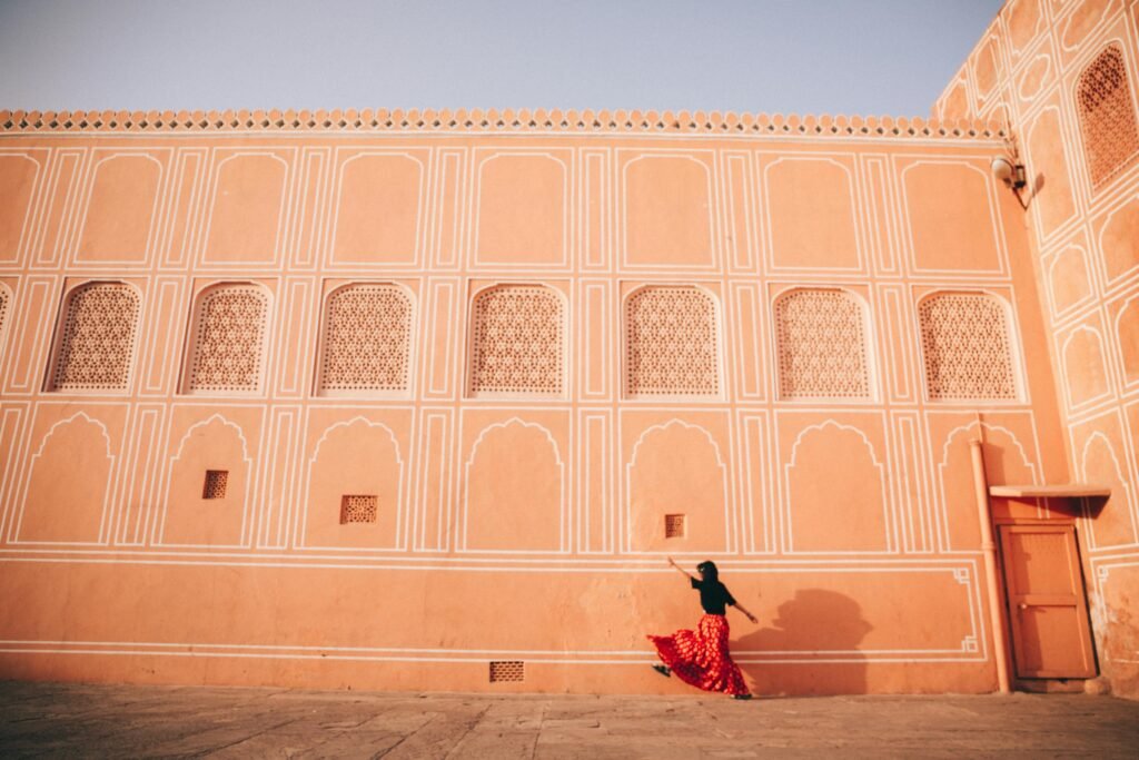 City Palace in Jaipur, India, featuring ornate latticework windows.