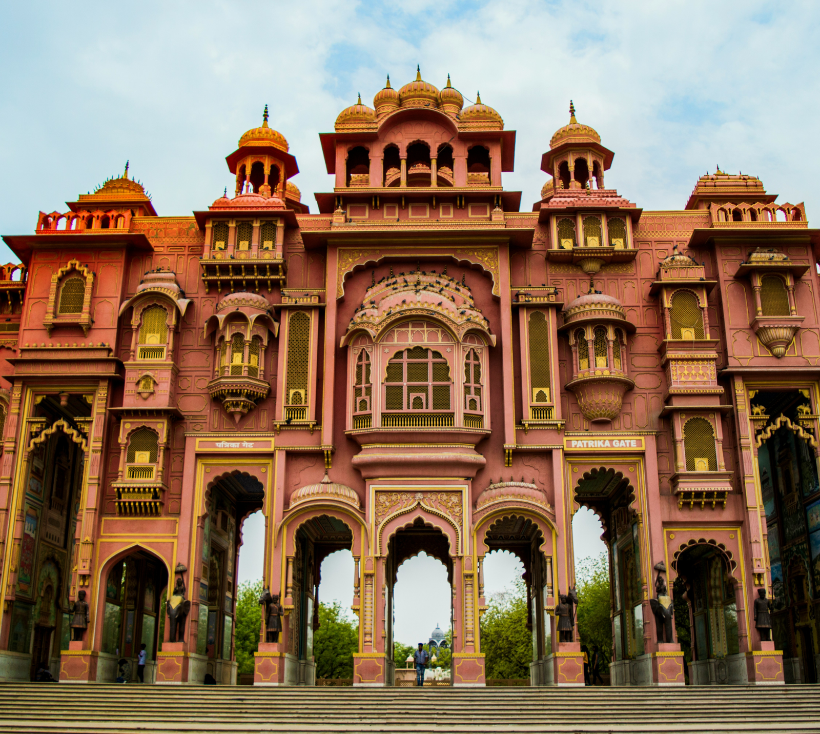 Birla Mandir 11 Patrika Gate in Jaipur, Rajasthan, is a vibrant modern landmark built in 2016 by the Patrika Group as the grand entrance to Jawahar Circle Garden. Serving as the conceptual "ninth gate" of the Pink City, its architecture and colorful interior frescoes pay homage to Rajasthan's rich royal heritage and traditional design.